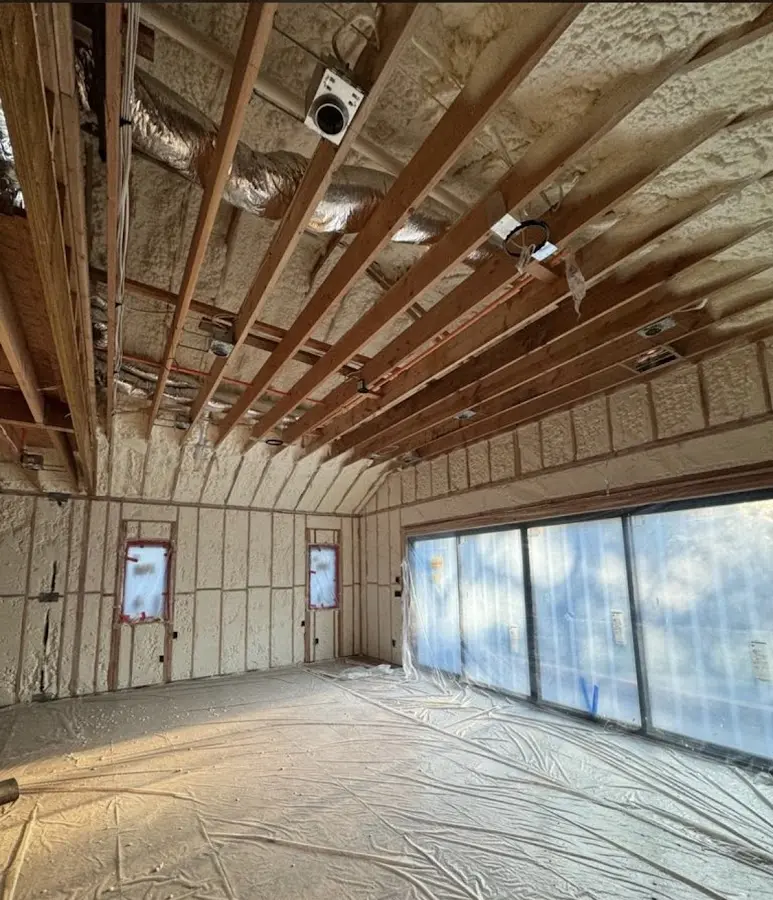 Interior walls and ceiling insulated with spray foam during new construction in Monee